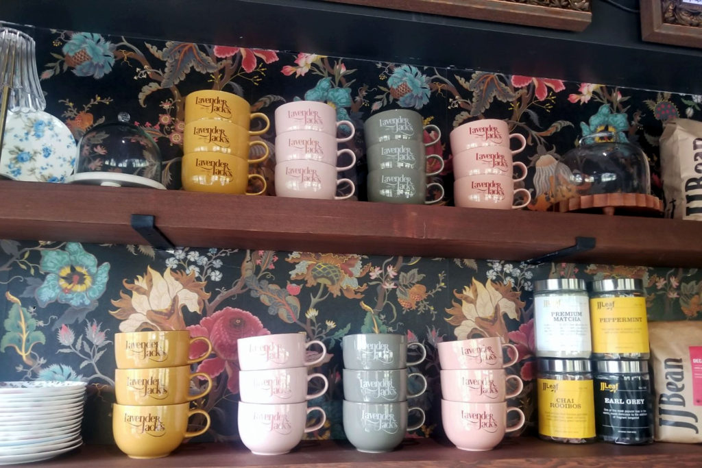 ceramic mugs on shelf