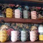 ceramic mugs on shelf
